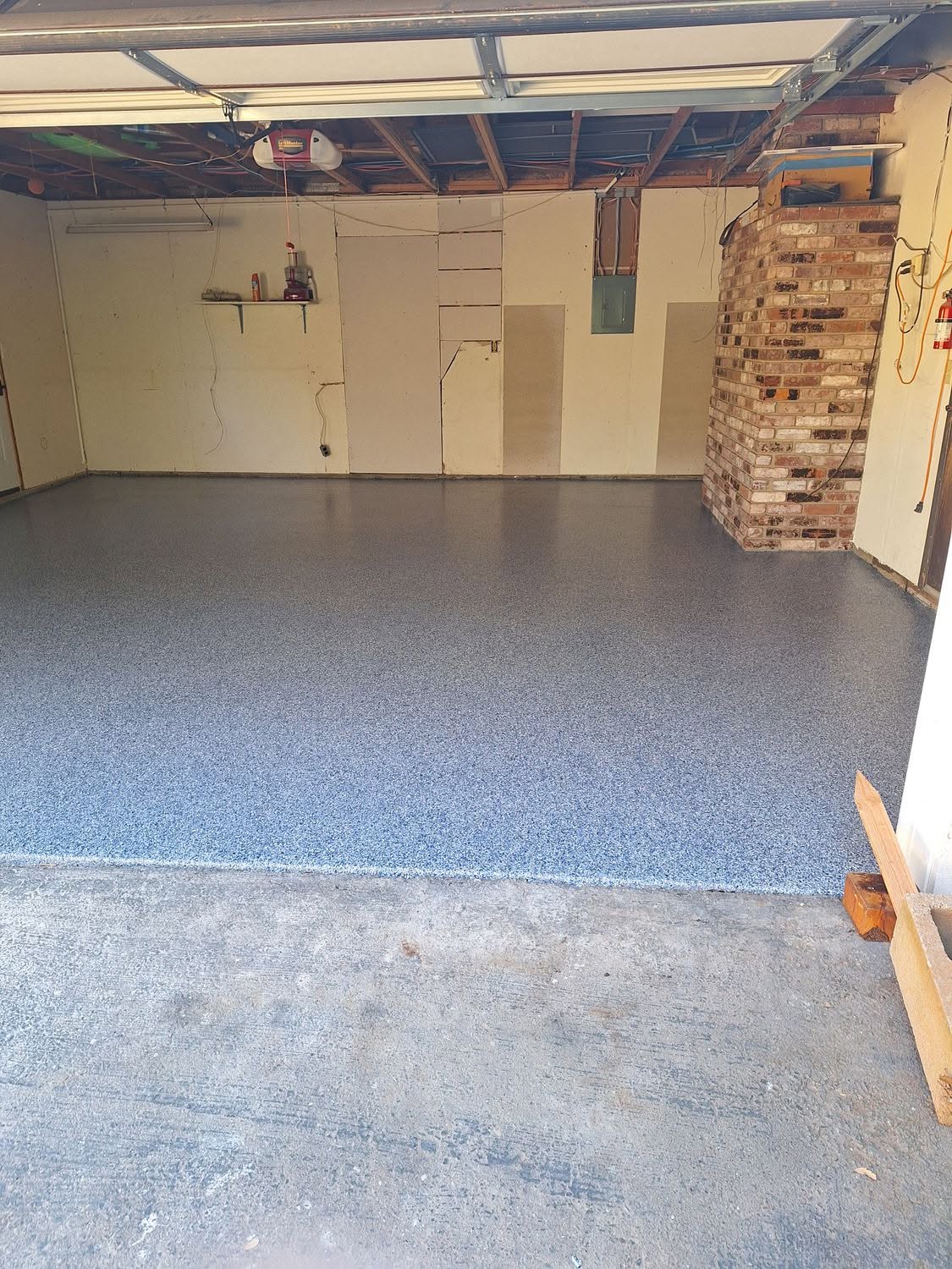Blue speckled epoxy garage floor