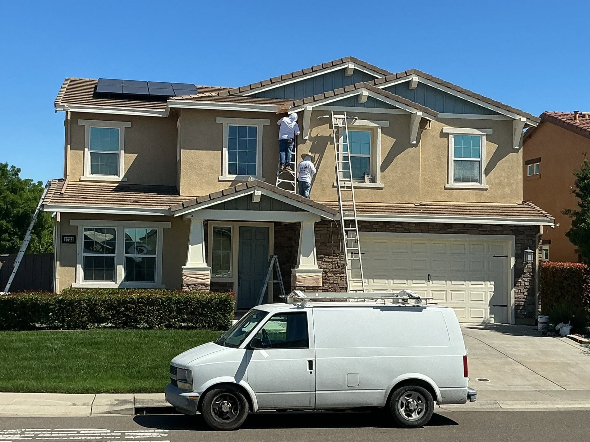 Velasco's Painting van and crew on site