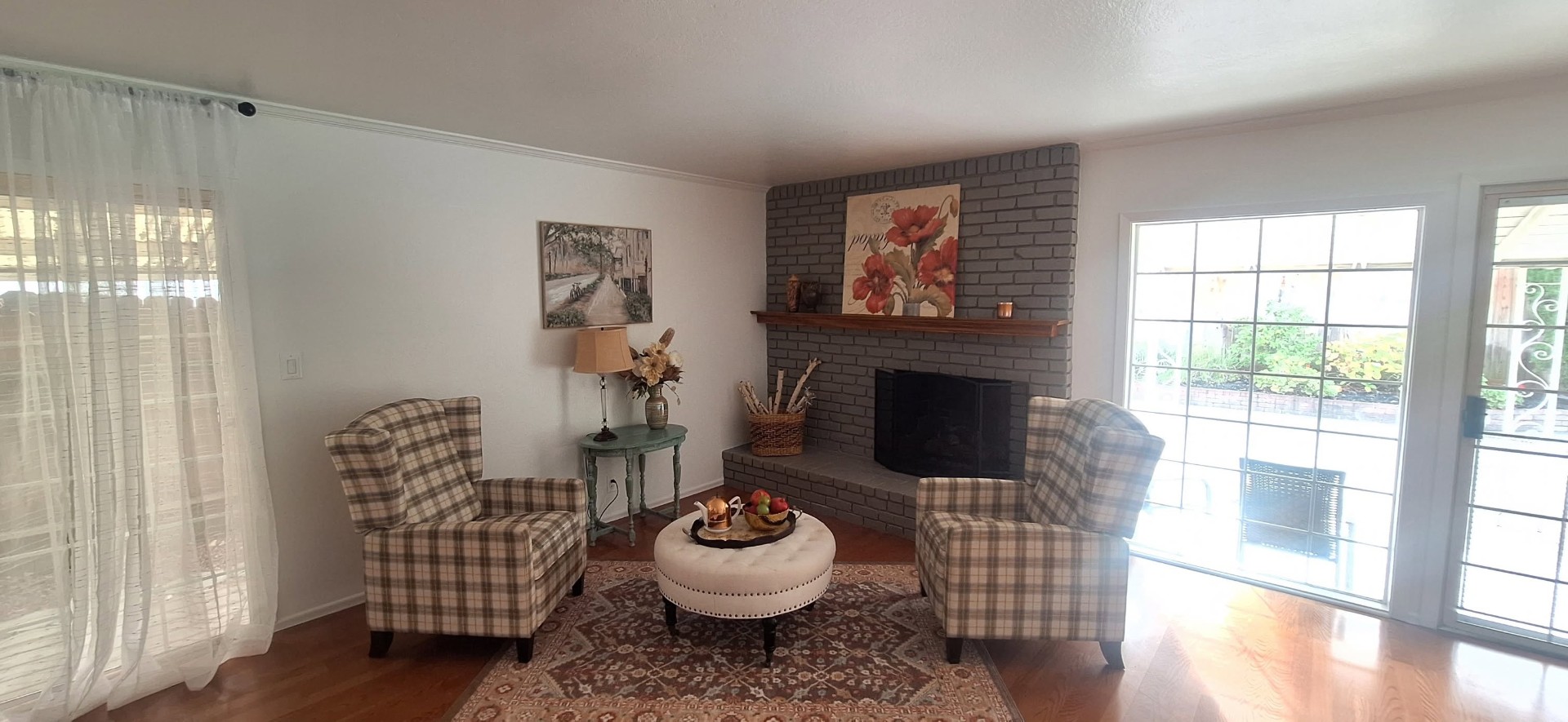 Interior repaint with painted brick fireplace