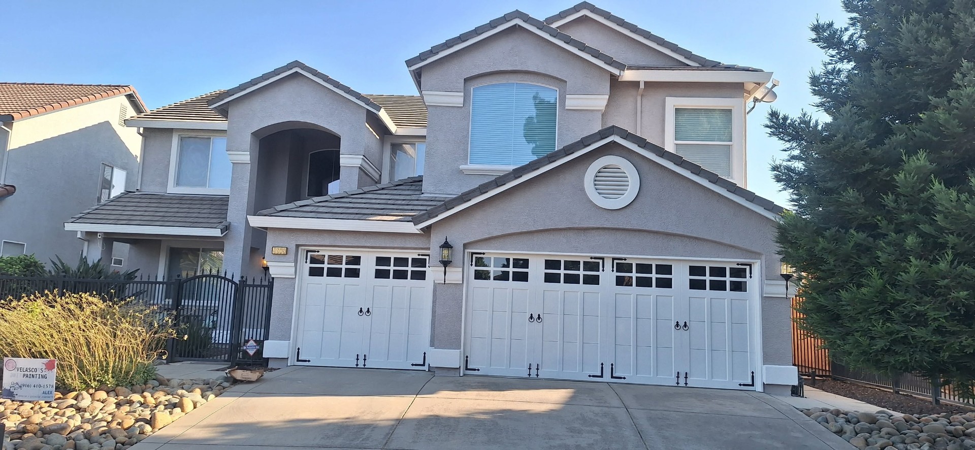 Exterior repaint on a Sacramento two-story home