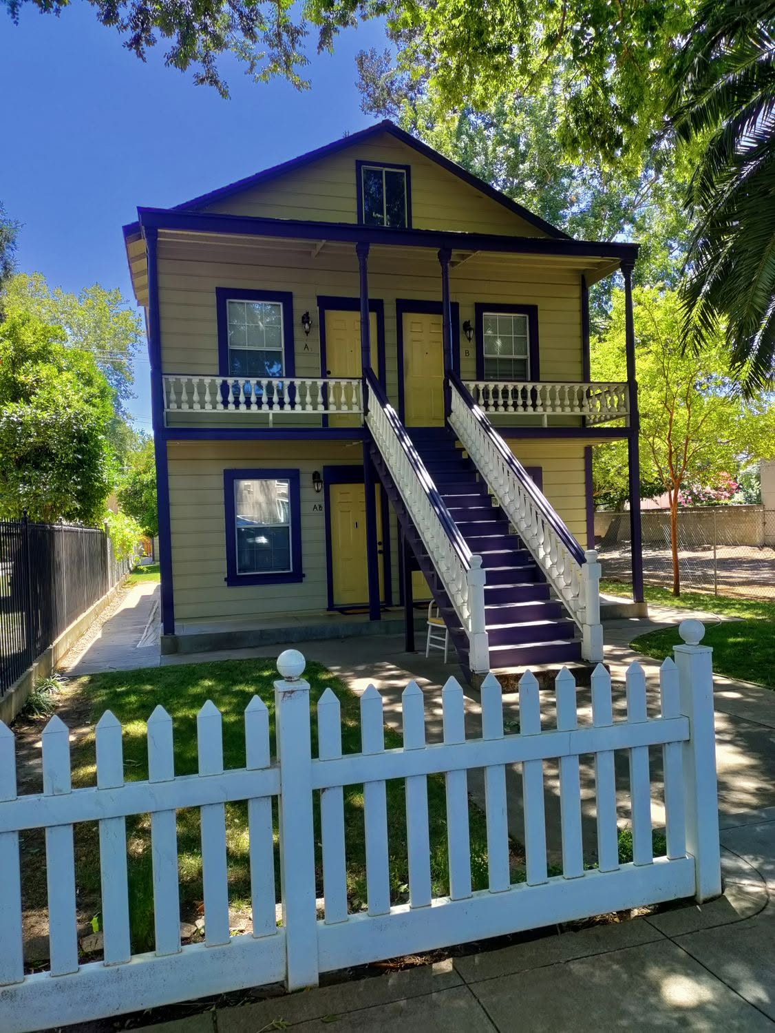 Victorian exterior with rich purple siding — Sacramento